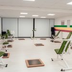 Bright and spacious gym interior featuring modern green exercise machines in Yalova.
